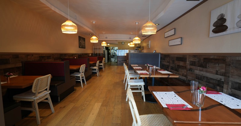 Interior, seating area, tables with chairs on both sides