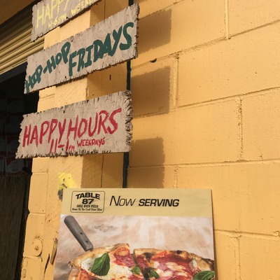 Happy hour sign.