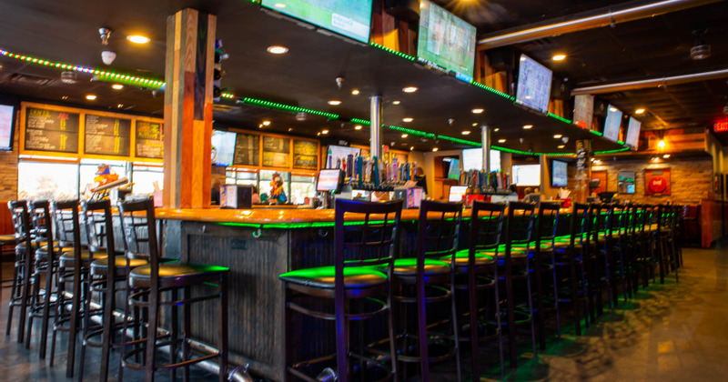 Bar Area with high chairs neatly lined up