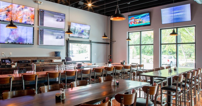Interior, bar and seating, TVs on walls