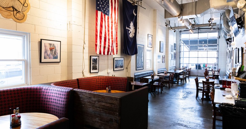 Interior, dining space with flags on the wall