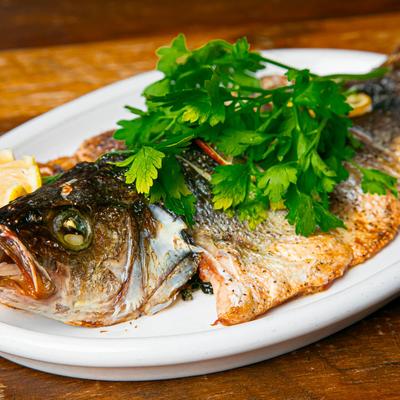 Grilled whole branzino.