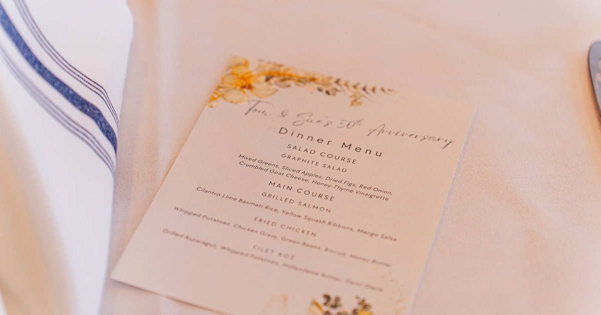 Interior, dining tables, a wine shelf, and a bar counter with stools