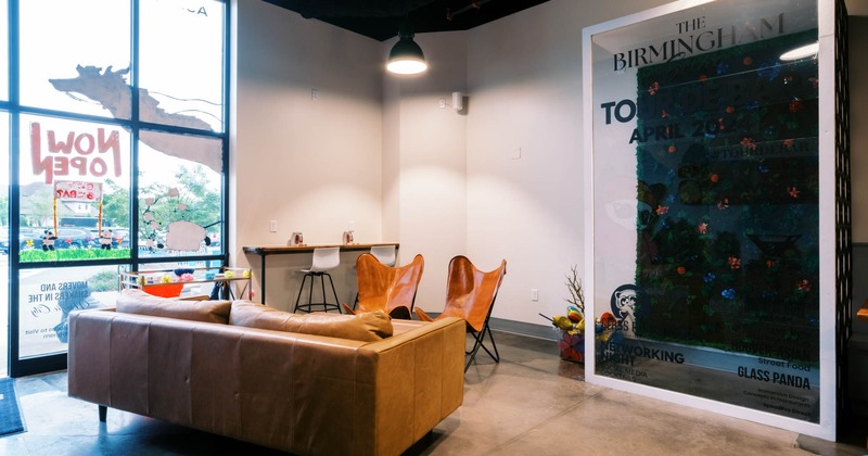 Interior, sofa with chairs, large shop window, restaurant entrance, chandelier