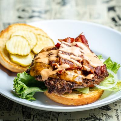 The classic burger with American cheese and bacon.