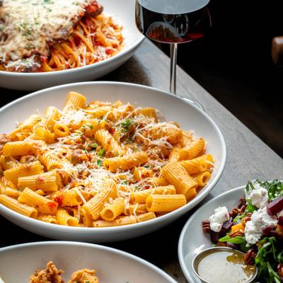 Spicy rigatoni pasta in vodka sauce, served with a beet salad and red wine.