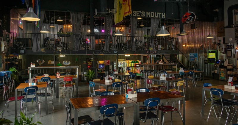 Inside, tables, chairs, spacious seating area