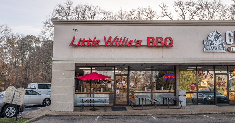 Exterior, front view to restaurant and part of parking lot