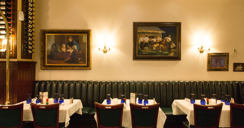 Interior, bench seating space, tables and chairs