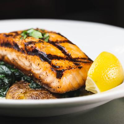 Grilled Italian Salmon, with spinach and roasted potatoes.