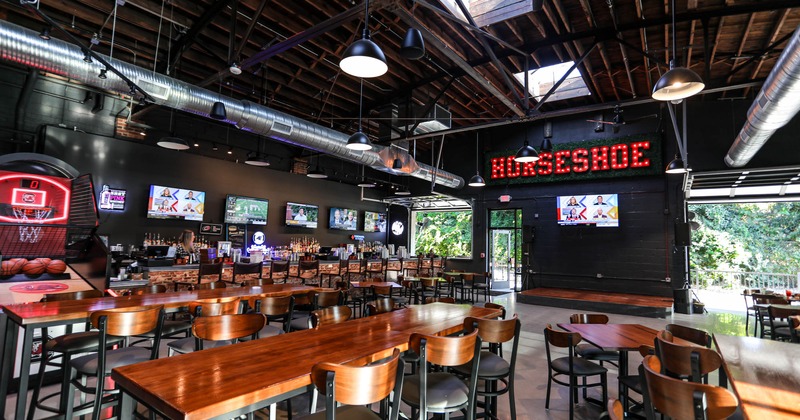 Interior, bar and seating area, with a music stage