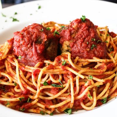 Spaghetti and meatballs, close-up.