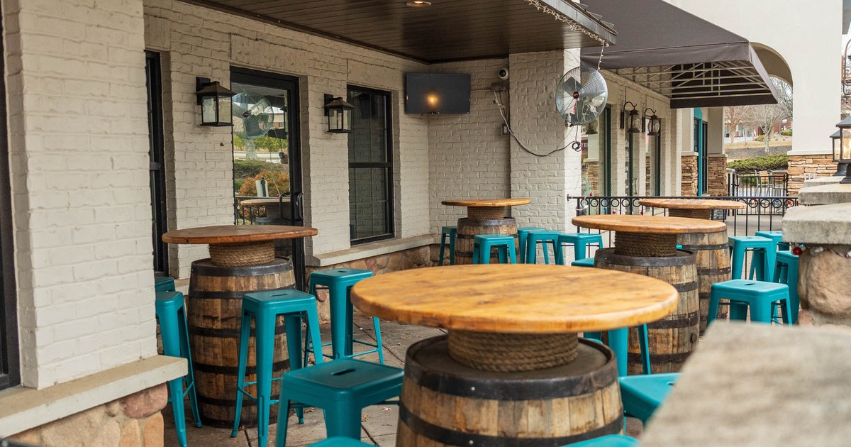 Exterior, barrel tables and bar stools
