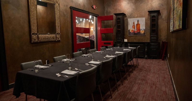 Interior, long table set for guests