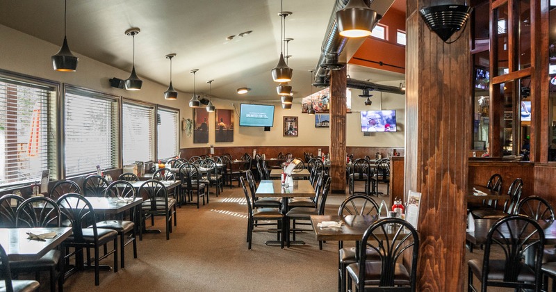 Interior, tables and chairs in dining area