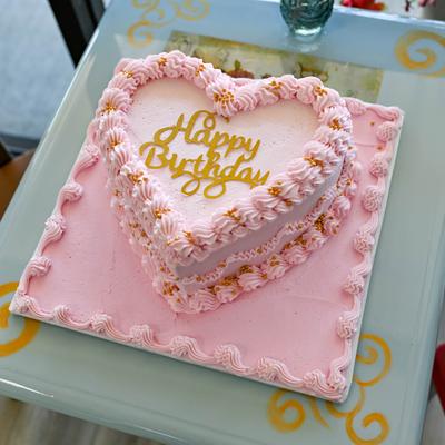 Heart shaped birthday cake.