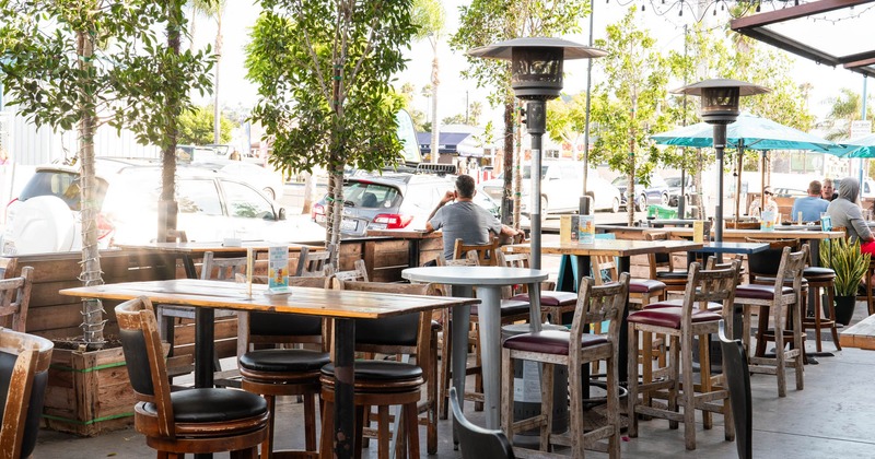 Exterior, seating area in front of the restaurant, tables and chairs