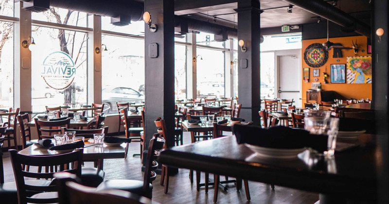 Interior, tables with cutlury ready for guests