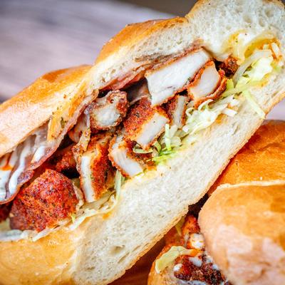 Close up shot of Buffalo bacon chicken sandwich.