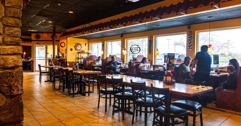Interior, main seating area, customers dining in booths