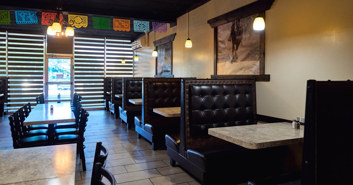 Interior, seating area with booths and tables