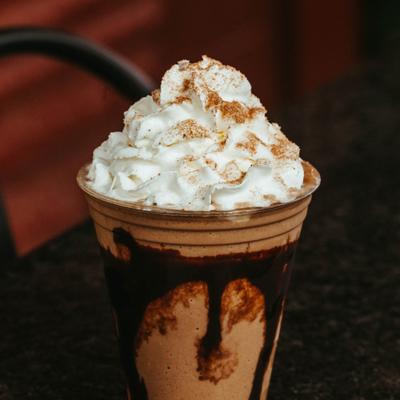 Iced mocha topped with whipped cream.