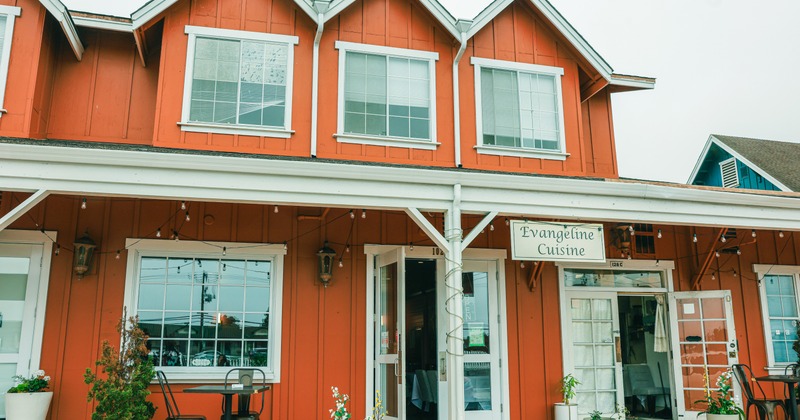 Exterior, front of restaurant, entrance, sign, angle lower view