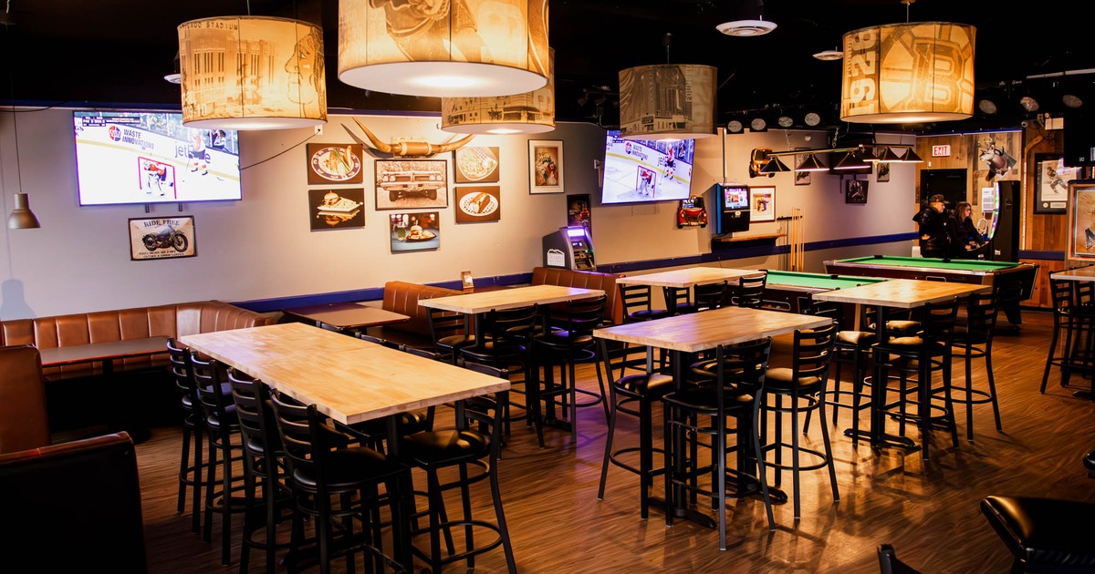 Interior, seating area, seating booths with tables, high seating tables for four and eight