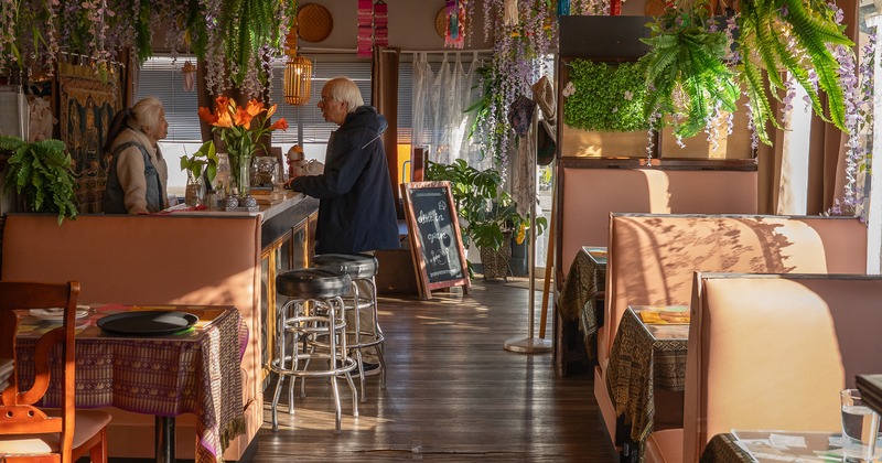 Interior, wide vie to diner area, tables, chairs, booths