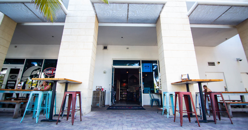 Entrance door and tall tables