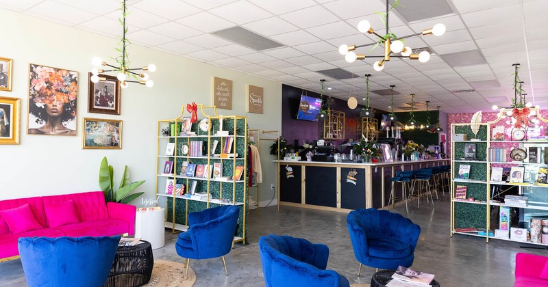 Interior, sofas and tables with bar in the back