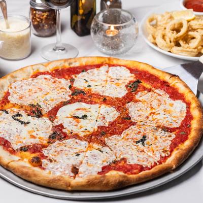 Margherita Pizza served with fried calamari.