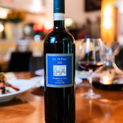 A bottle of red wine.