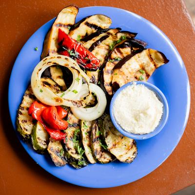 Grilled eggplant, tomato, and onion.