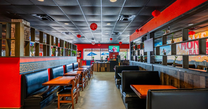 Interior, seating area with booths, tables and chairs