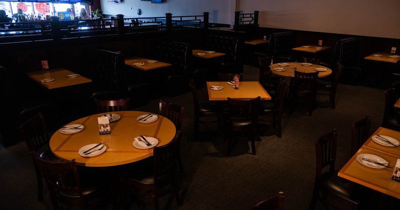 Interior, dining area with tables set for guests