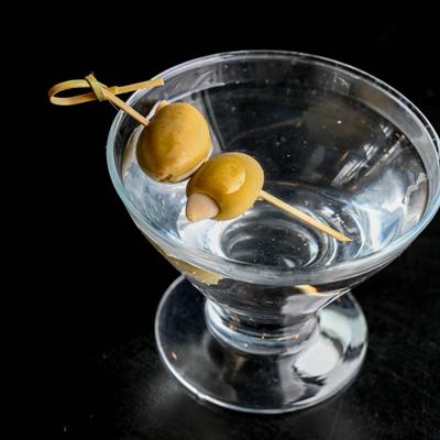 Dirty Martini decorated with two olives.