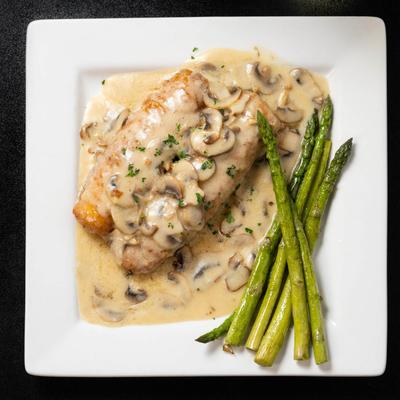 Chicken Rollatini with asparagus.