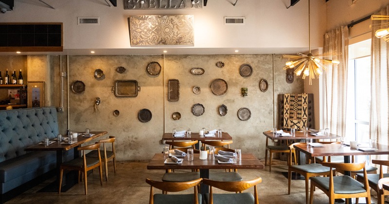 Interior, tables and chairs in dining area