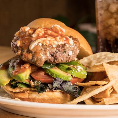 Arapaho Beach Burger with corn tortilla chips on the side.