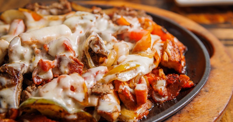 Alambre dish with beef and chicken fajita, closeup