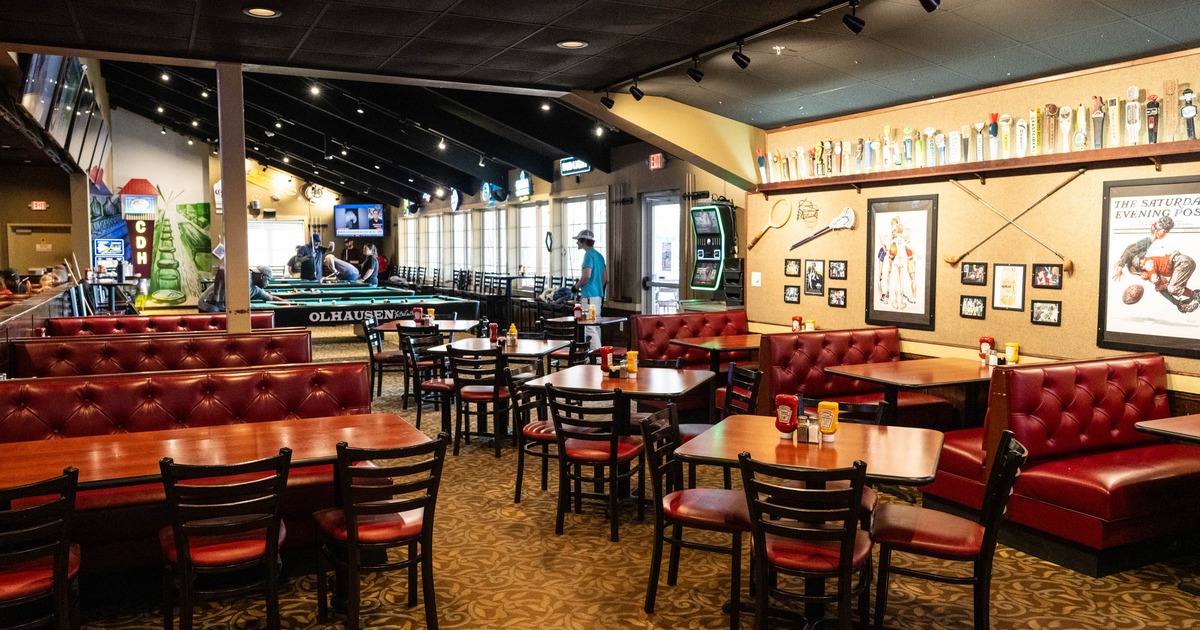 Interior, dining area, wooden top tables for four, seating booths for four and six