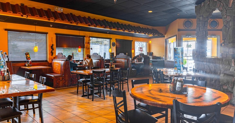 Interior, dining space with tables and booths