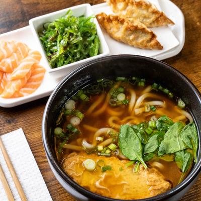 Udon noodle soup with sides.