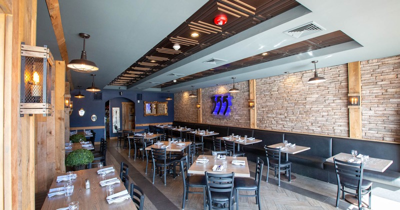 Interior, dining area, logo on the wall