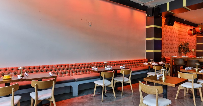 Interior, dining area, tables, chairs and banquette seating