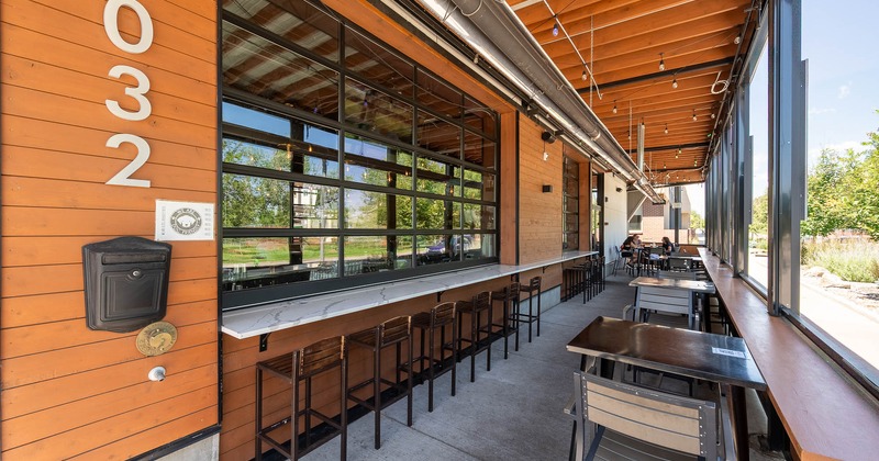 Seating place with stool chairs and wall table