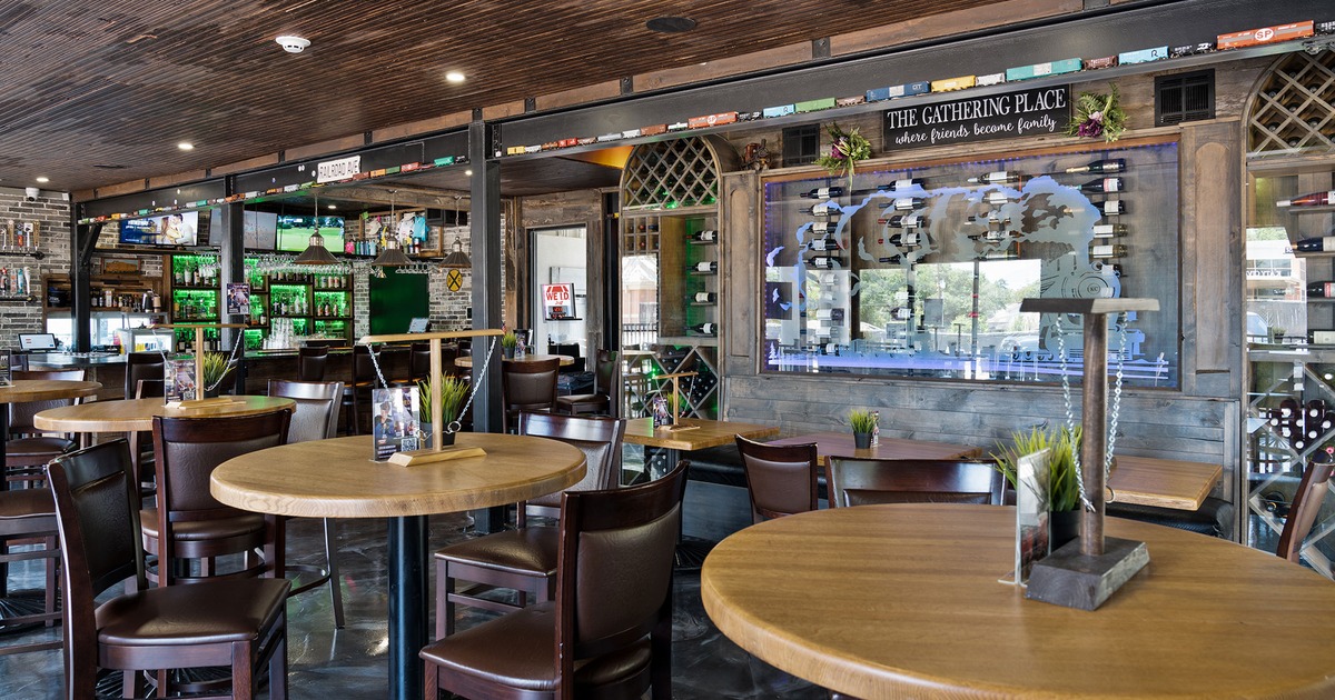Interior, seating space with high tables and stools