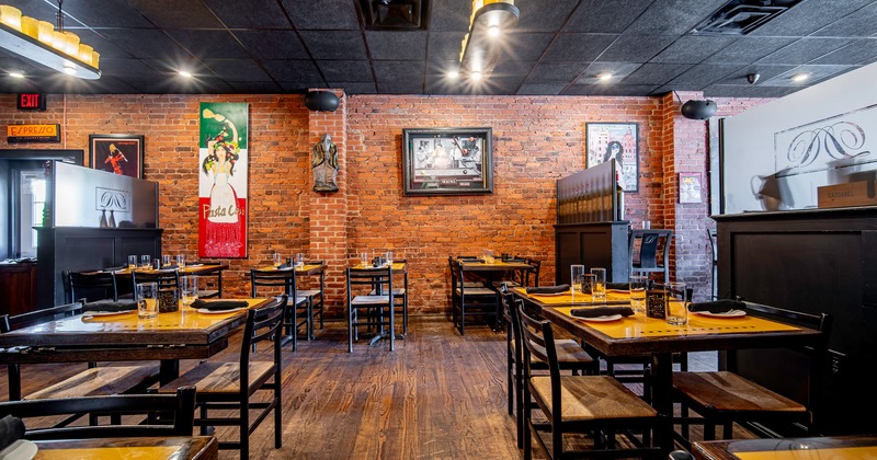 Warm and cozy restaurant interior dining area with set tables