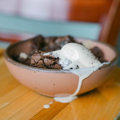 A savory meal dripping out of the plate.